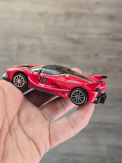 1:43 Bburago Ferrari FXX K Number 10 - Red (Uncarded - New) - Kinder Logs