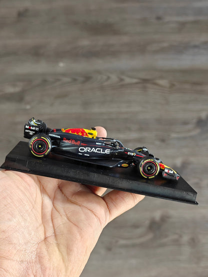 1:43 Bburago Oracle Red Bull Racing RB20 1 (Open Box) - Kinder Logs
