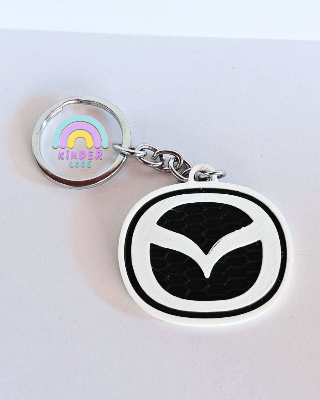 3D-Printed Mazda Logo Key Chain - Kinder Logs