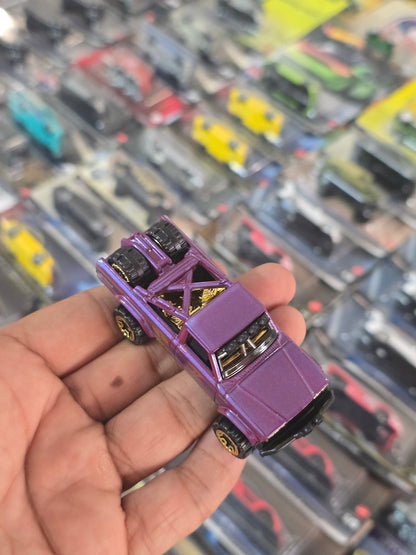 57th Anniversary Hot Wheels 1973 Jeep J10 (Uncarded) - Kinder Logs
