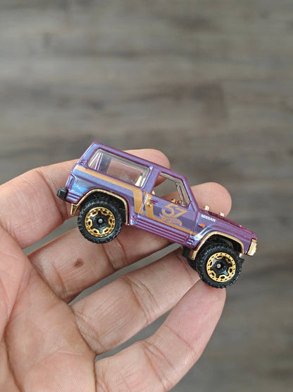 57th Anniversary Hot Wheels Nissan Patrol Custom (Uncarded - New) - Kinder Logs
