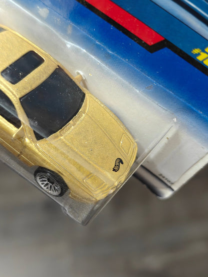 Blue Card Hot Wheels BMW 850i - Gold - Kinder Logs