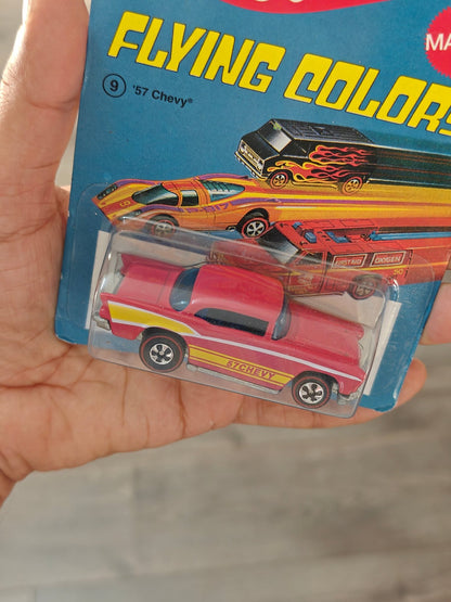 Hot Wheels 1957 Chevy "Flying Colors" (Imported) - Kinder Logs