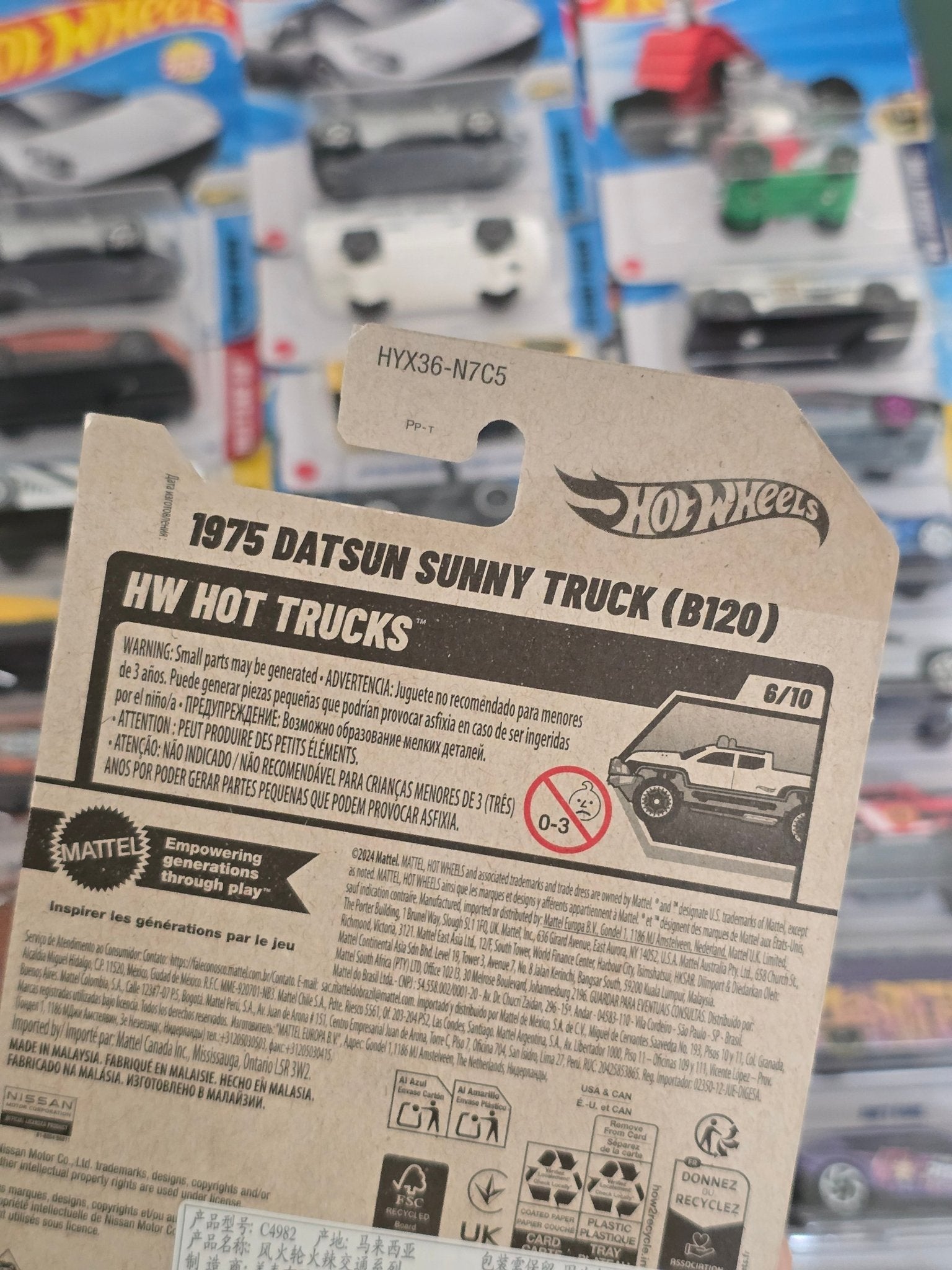 Hot Wheels 1975 Datsun Sunny Truck B120 (Imported) - Kinder Logs