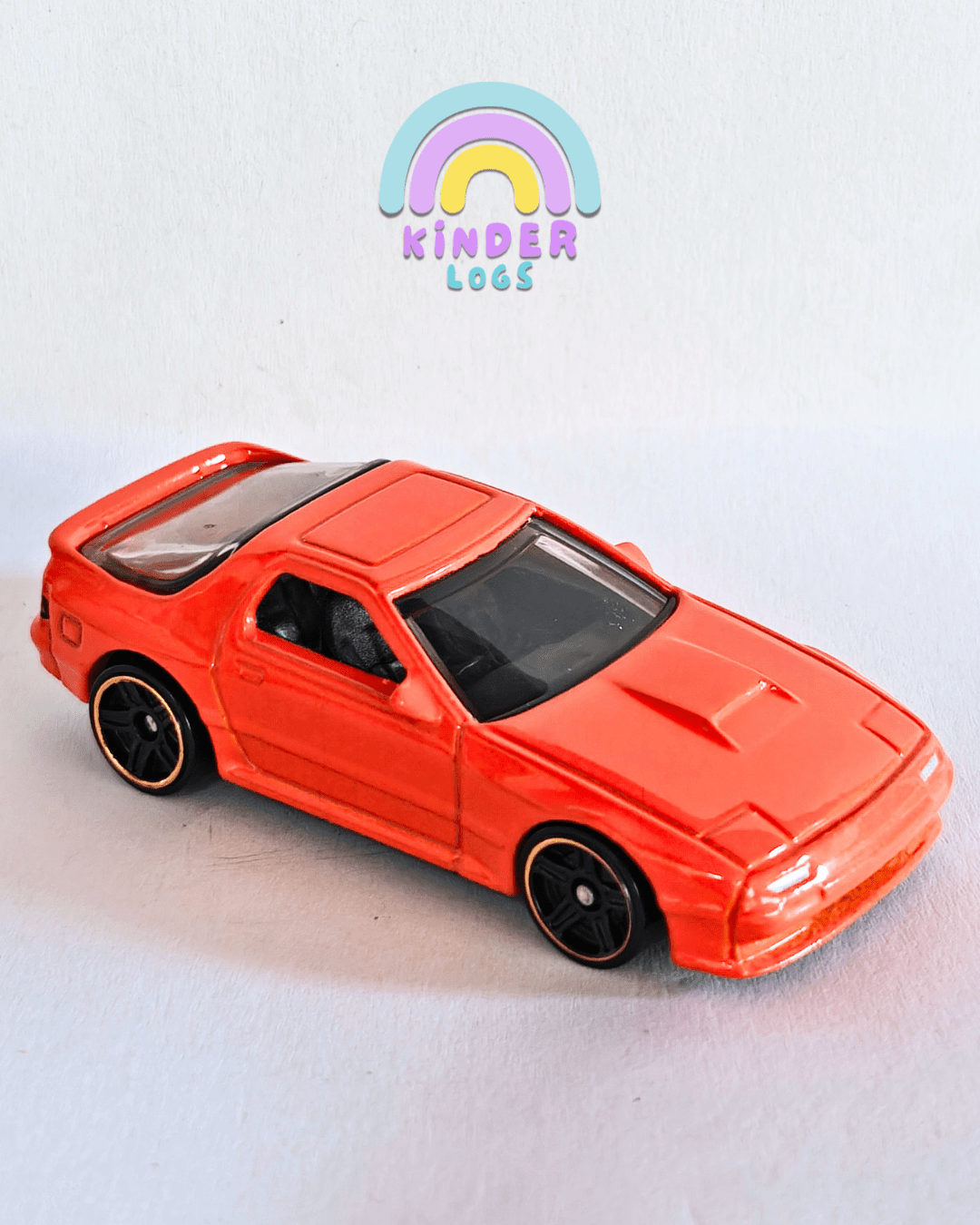 Hot Wheels 1989 Mazda Savanna RX7 (Orange) - Kinder Logs