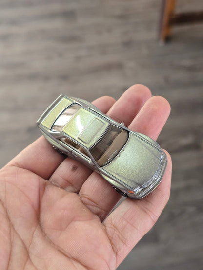 Hot Wheels 1989 Mercedes - Benz 560 SEC AMG - Glitter Gold (Uncarded - New) - Kinder Logs