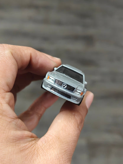 Hot Wheels 1989 Mercedes - Benz 560 SEC AMG - Silver (Uncarded) - Kinder Logs