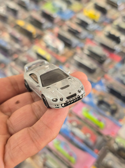 Hot Wheels 1995 Toyota Celica GT - FOUR (Uncarded) - Kinder Logs