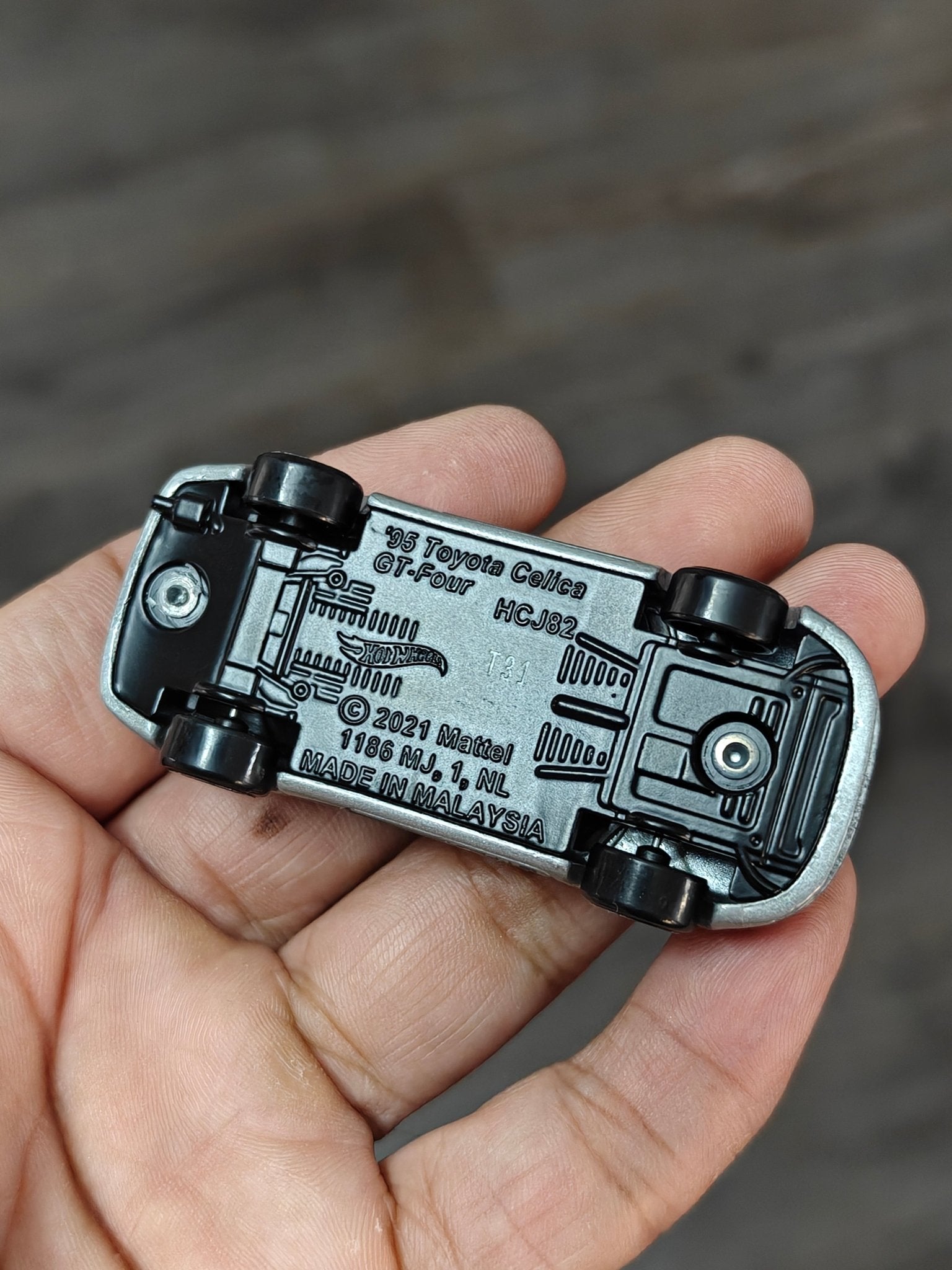 Hot Wheels 1995 Toyota Celica GT - FOUR (Uncarded - New) - Kinder Logs