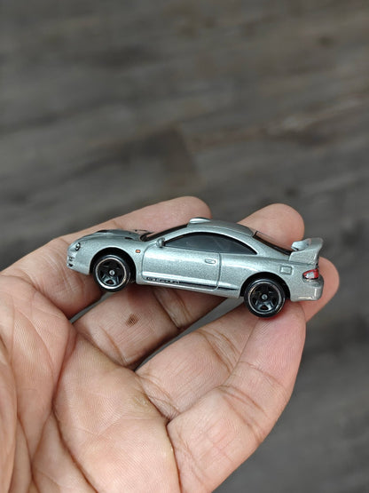 Hot Wheels 1995 Toyota Celica GT - FOUR (Uncarded - New) - Kinder Logs