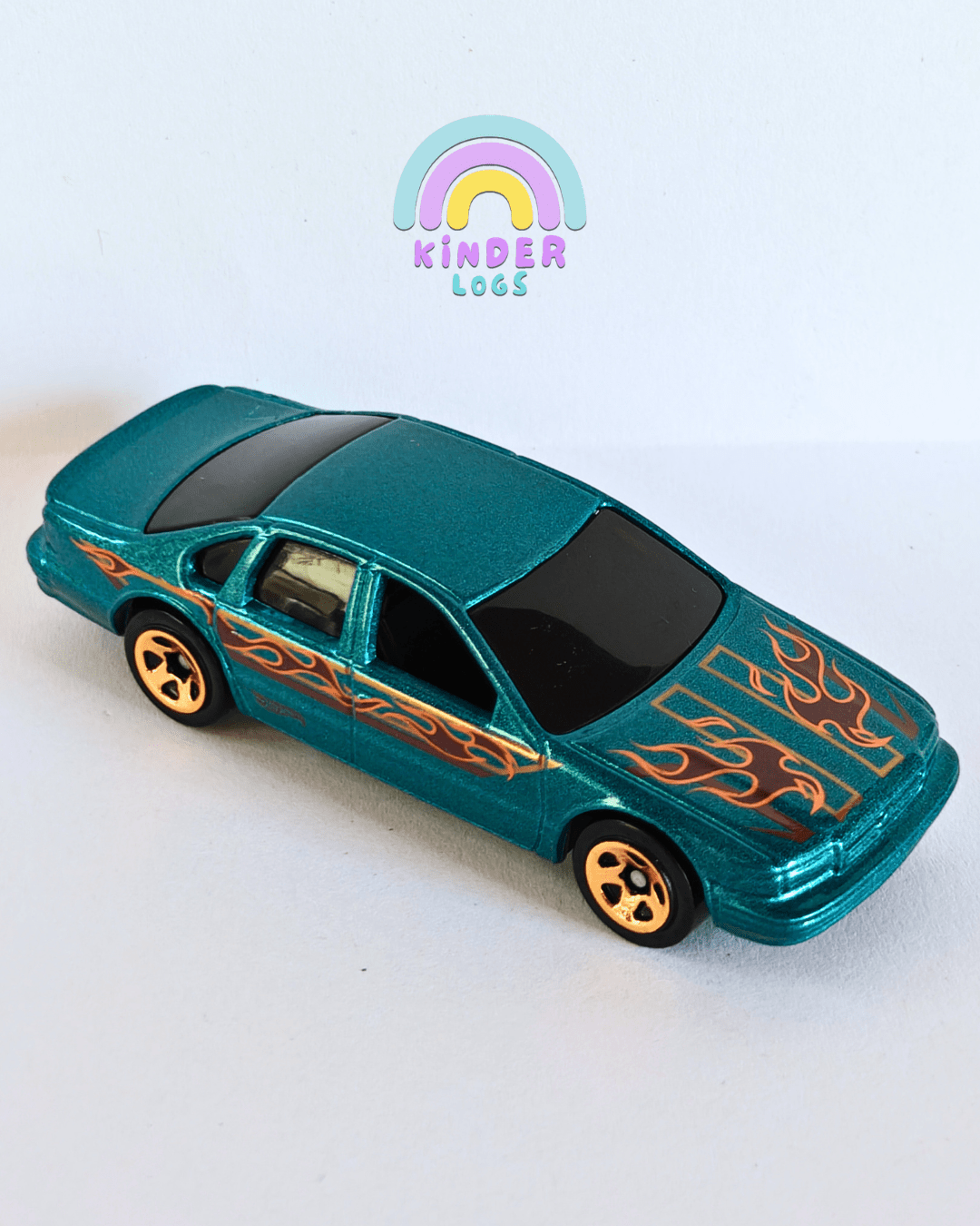 Hot Wheels 1996 Chevrolet Impala SS - Teal (Uncarded - New) - Kinder Logs