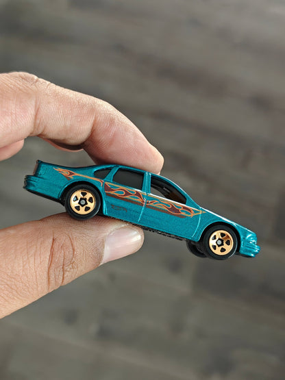 Hot Wheels 1996 Chevrolet Impala SS - Teal (Uncarded - New) - Kinder Logs