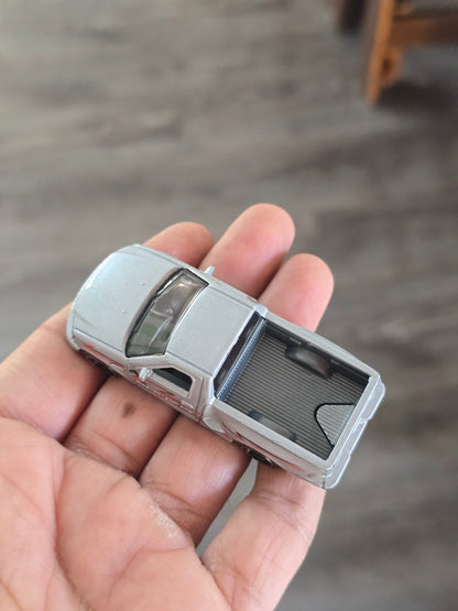 Hot Wheels 1999 Ford F - 150 SVT Lightning - Silver (Uncarded - New) - Kinder Logs