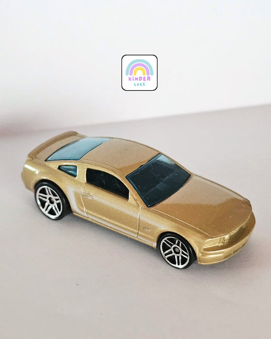 Hot Wheels 2005 Ford Mustang GT - Gold Color (Uncarded) - Kinder Logs