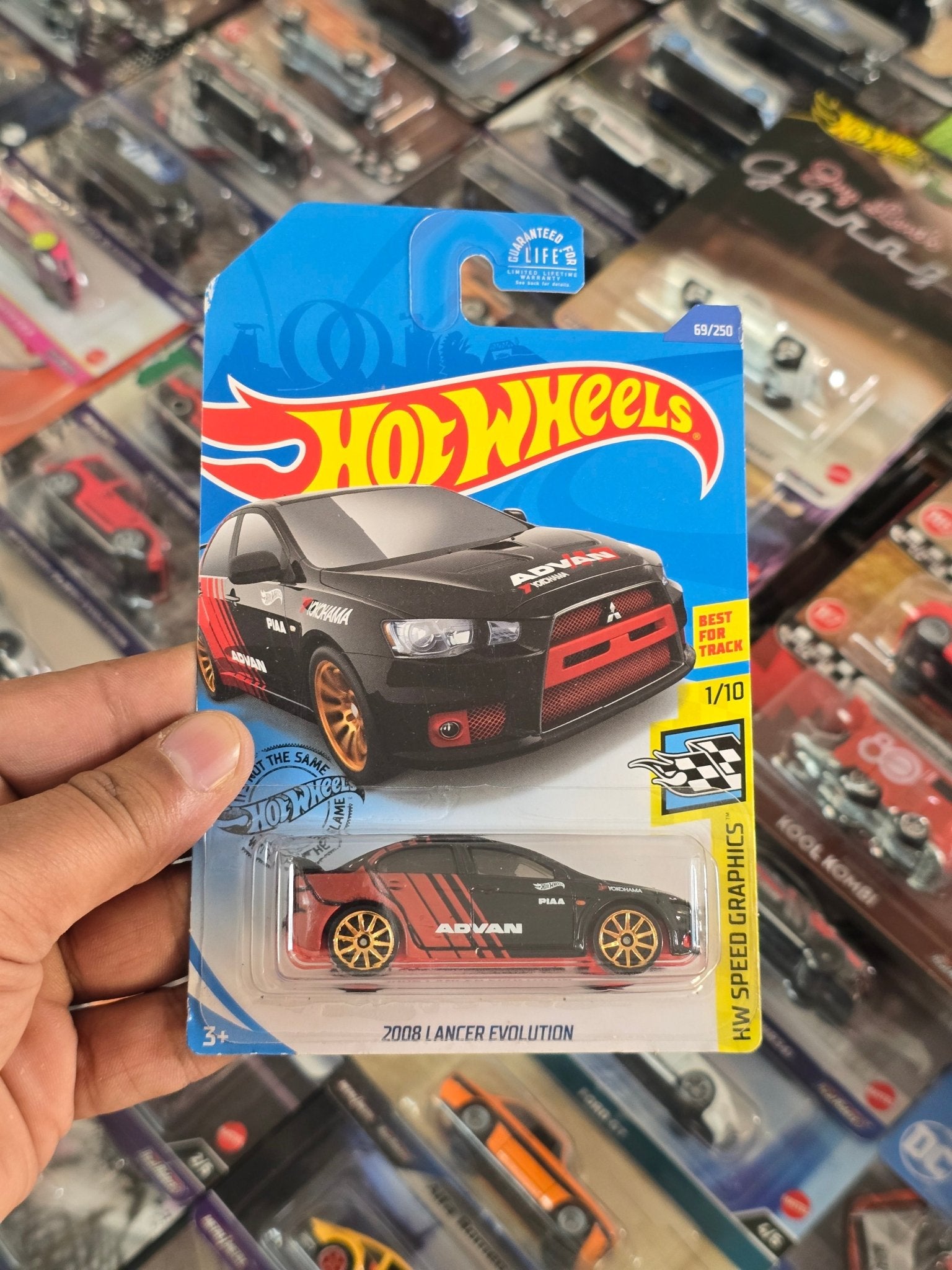 Hot Wheels 2008 Mitsubishi Lancer Evolution Advan Edition (Imported) - Kinder Logs