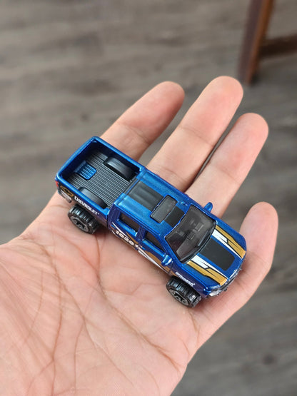 Hot Wheels 2019 Chevy Silverado Trail Boss LT - Blue (Uncarded - New) - Kinder Logs