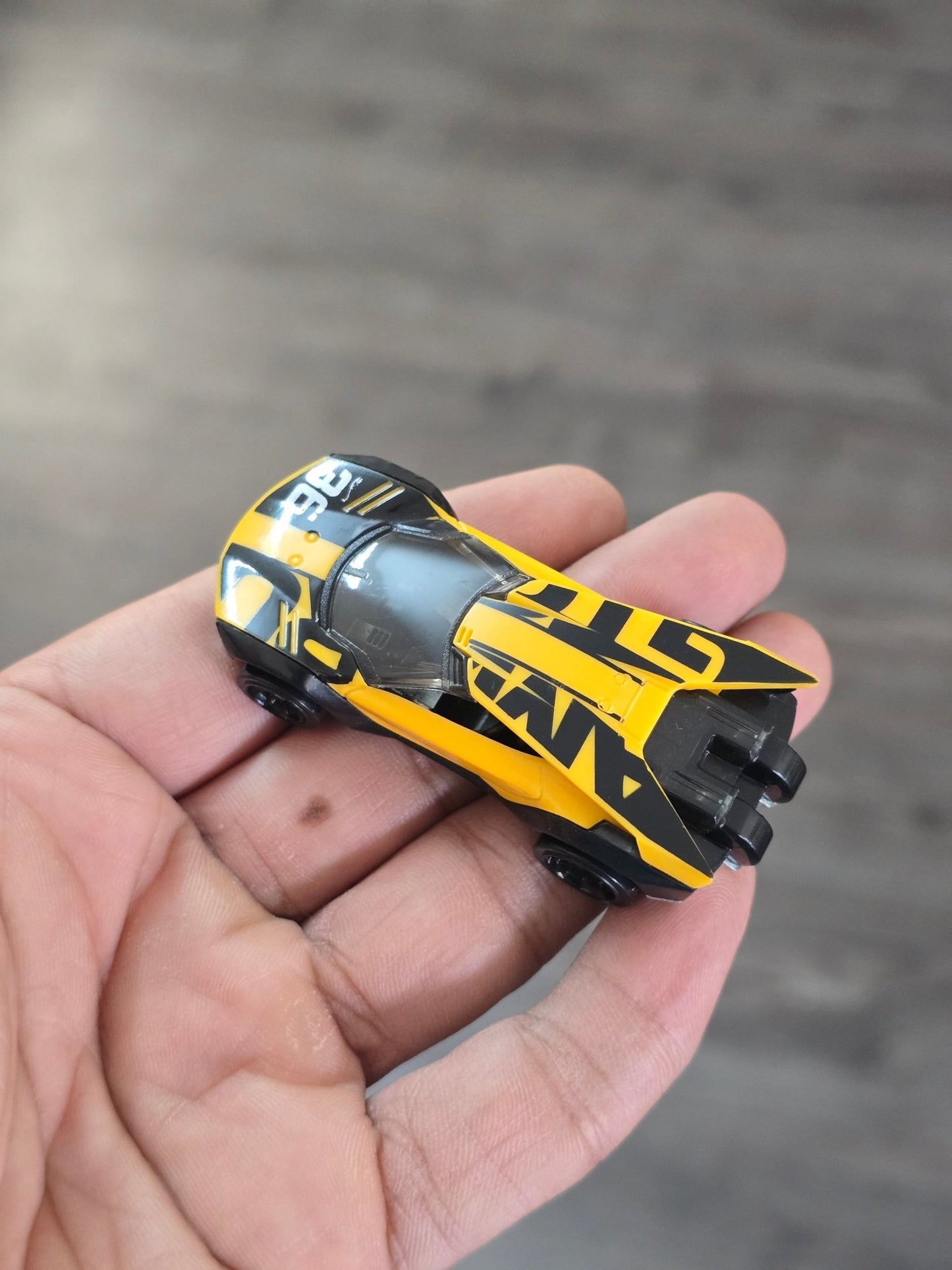 Hot Wheels Amaru GTC - Yellow - With Metal Base (Uncarded - New) - Kinder Logs