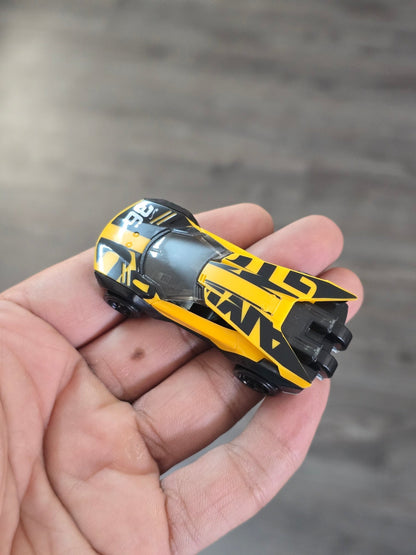 Hot Wheels Amaru GTC - Yellow - With Metal Base (Uncarded - New) - Kinder Logs