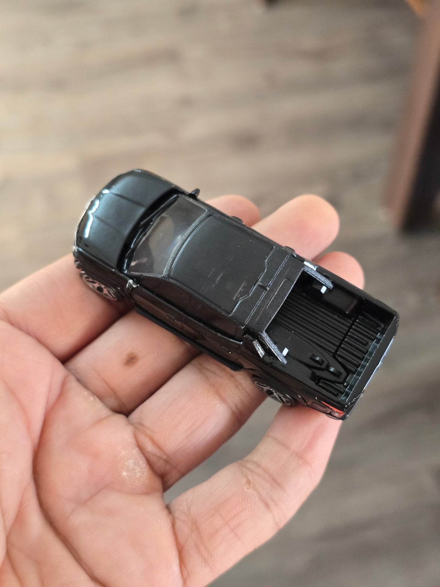 Hot Wheels Chevrolet Silverado EV RST - Black (Uncarded - New) - Kinder Logs