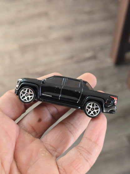 Hot Wheels Chevrolet Silverado EV RST - Black (Uncarded - New) - Kinder Logs