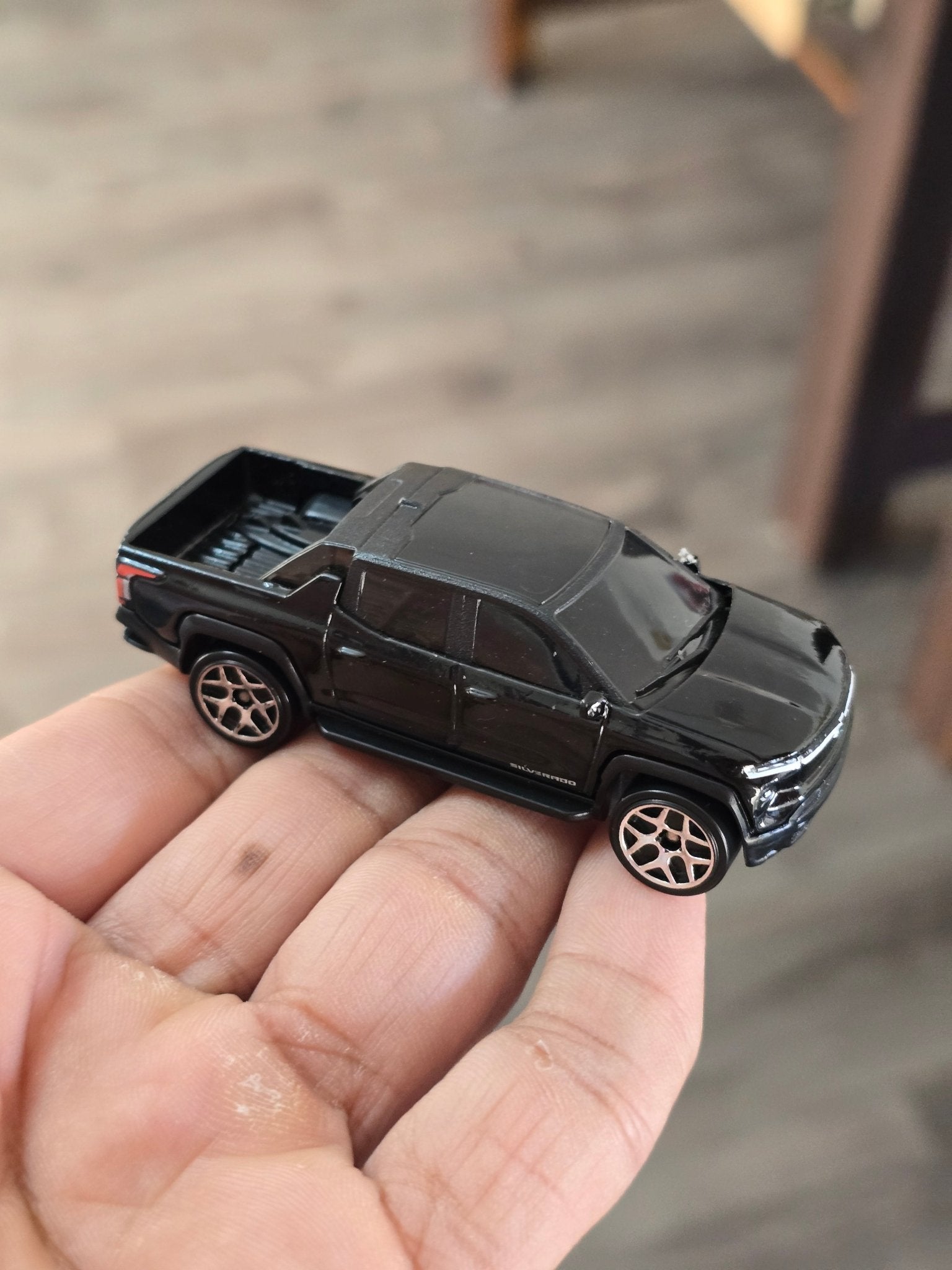 Hot Wheels Chevrolet Silverado EV RST - Black (Uncarded - New) - Kinder Logs