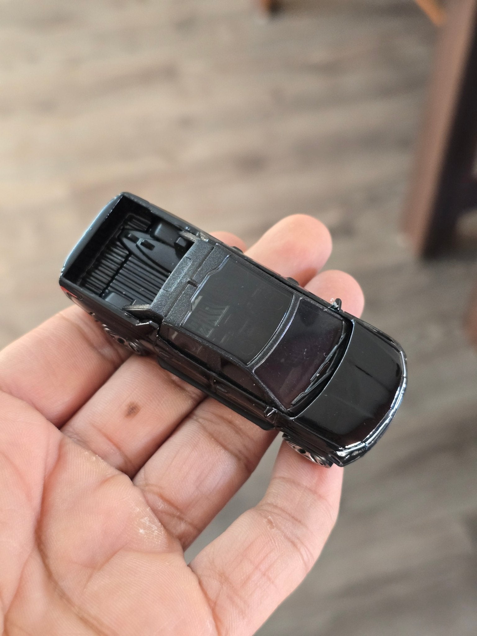 Hot Wheels Chevrolet Silverado EV RST - Black (Uncarded - New) - Kinder Logs