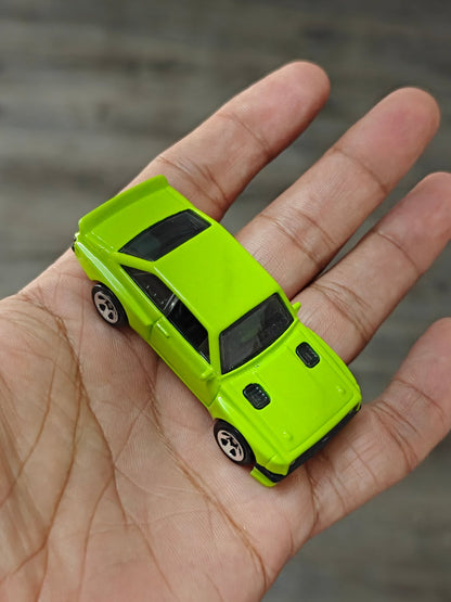 Hot Wheels Ford Escort RS2000 - Green (Uncarded - New) - Kinder Logs