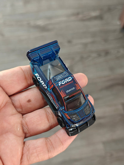 Hot Wheels Ford F - 150 Lightning Supertruck (Uncarded - New) - Kinder Logs
