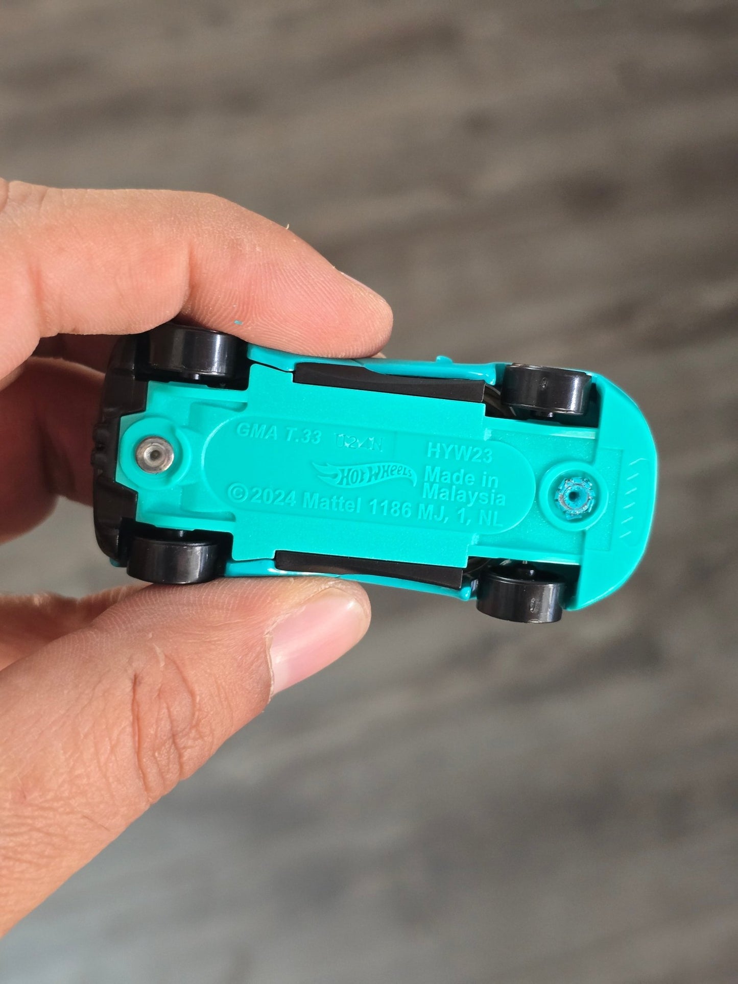 Hot Wheels Gordon Murray Automotive T.33 - Turquoise (Uncarded - New) - Kinder Logs