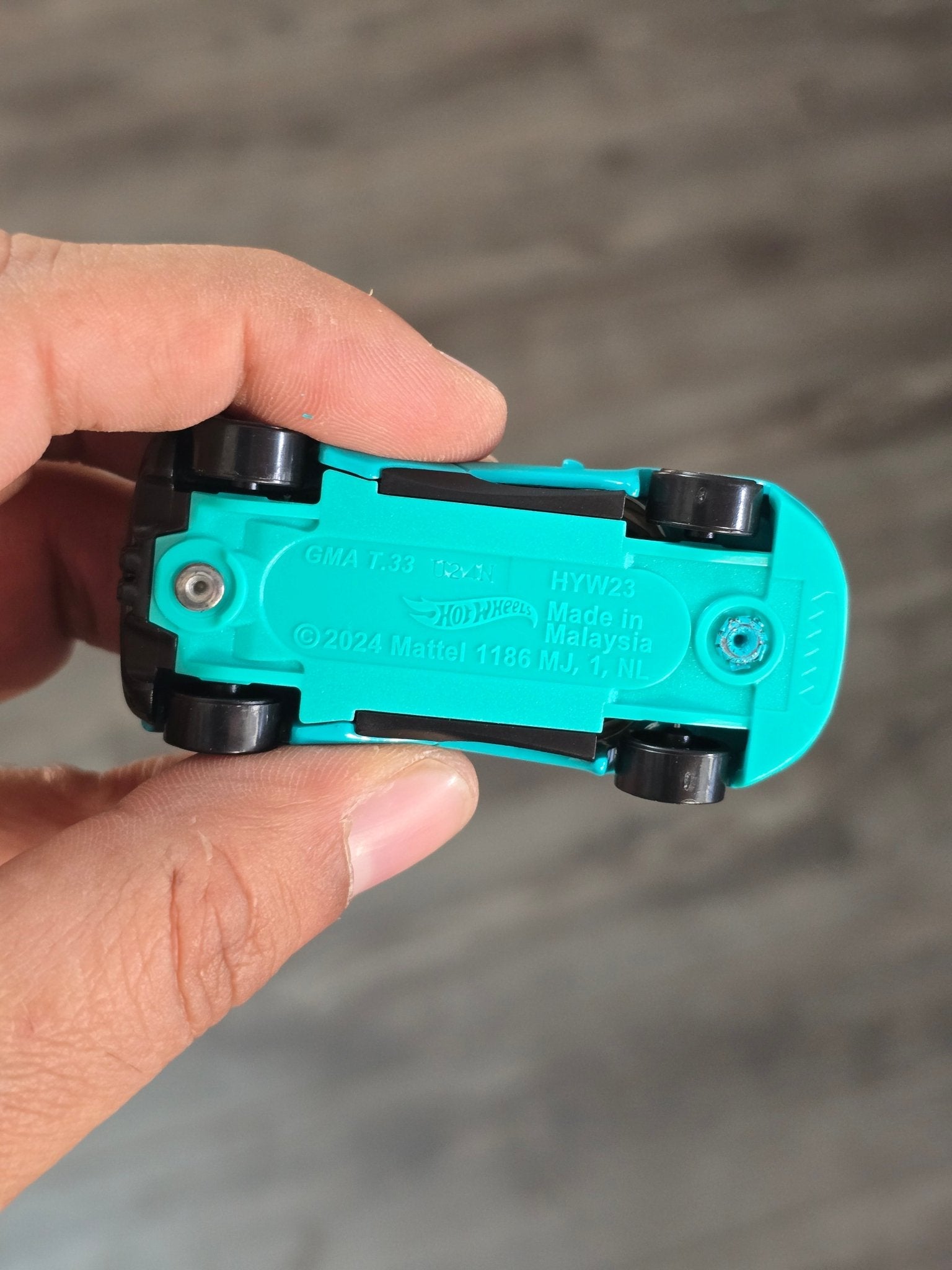 Hot Wheels Gordon Murray Automotive T.33 - Turquoise (Uncarded - New) - Kinder Logs