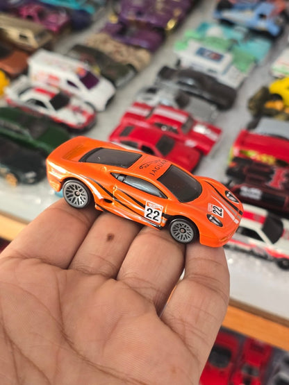 Hot Wheels Jaguar XJ220 - Orange (Uncarded) - Kinder Logs
