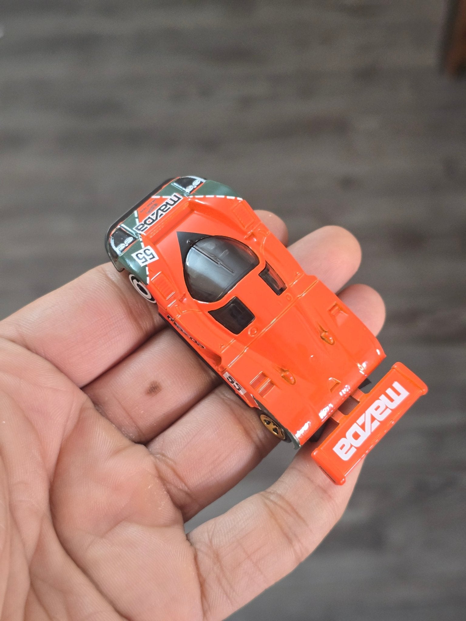 Hot Wheels Mazda 787B - Orange (Uncarded - New) - Kinder Logs