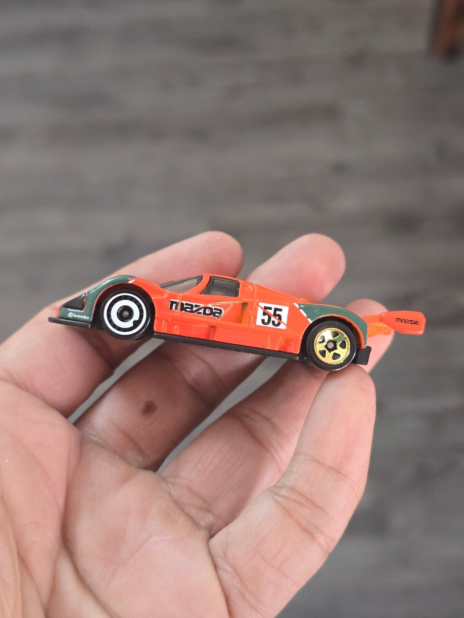 Hot Wheels Mazda 787B - Orange (Uncarded - New) - Kinder Logs