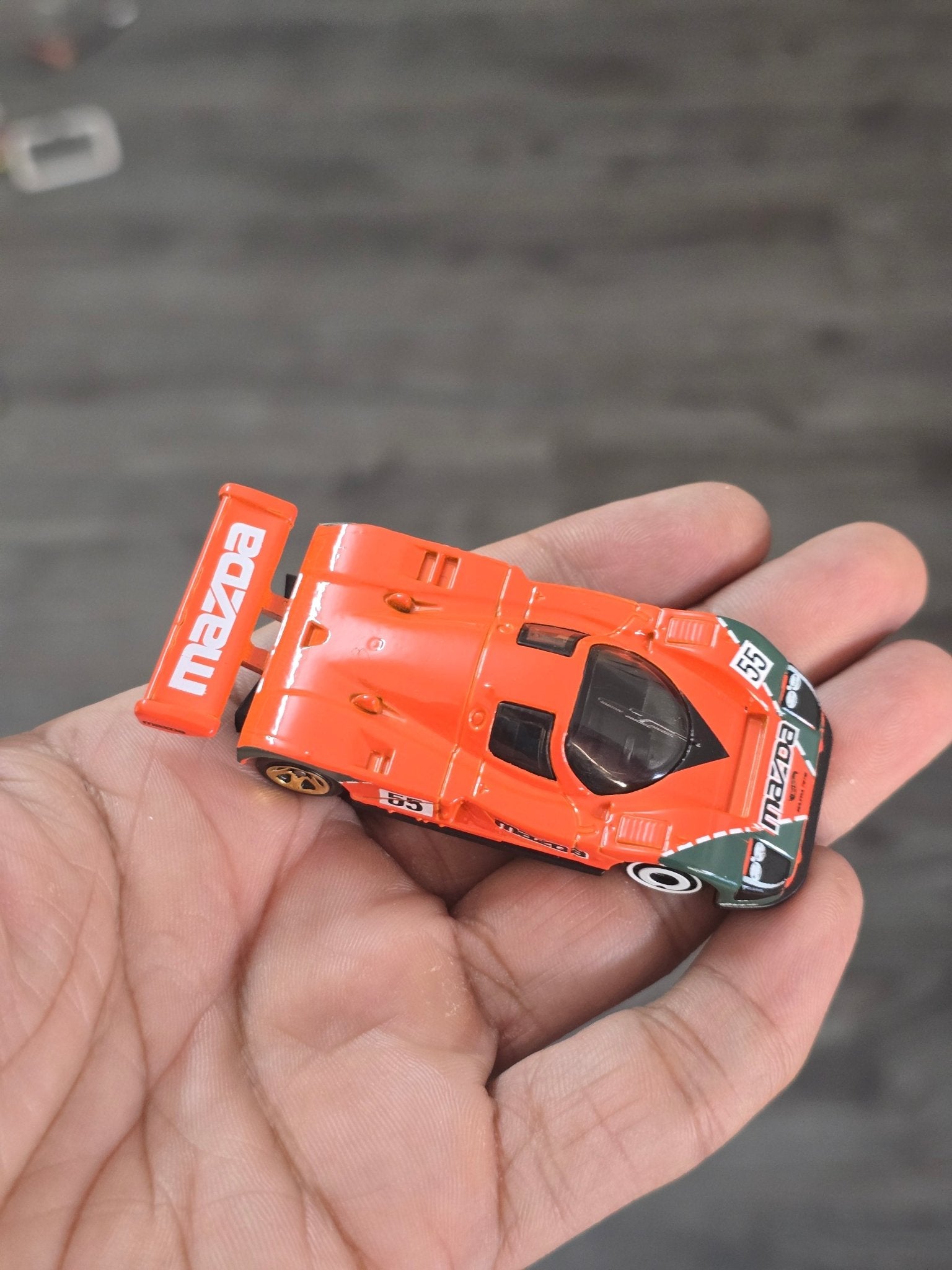 Hot Wheels Mazda 787B - Orange (Uncarded - New) - Kinder Logs
