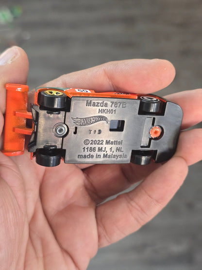 Hot Wheels Mazda 787B - Orange (Uncarded - New) - Kinder Logs