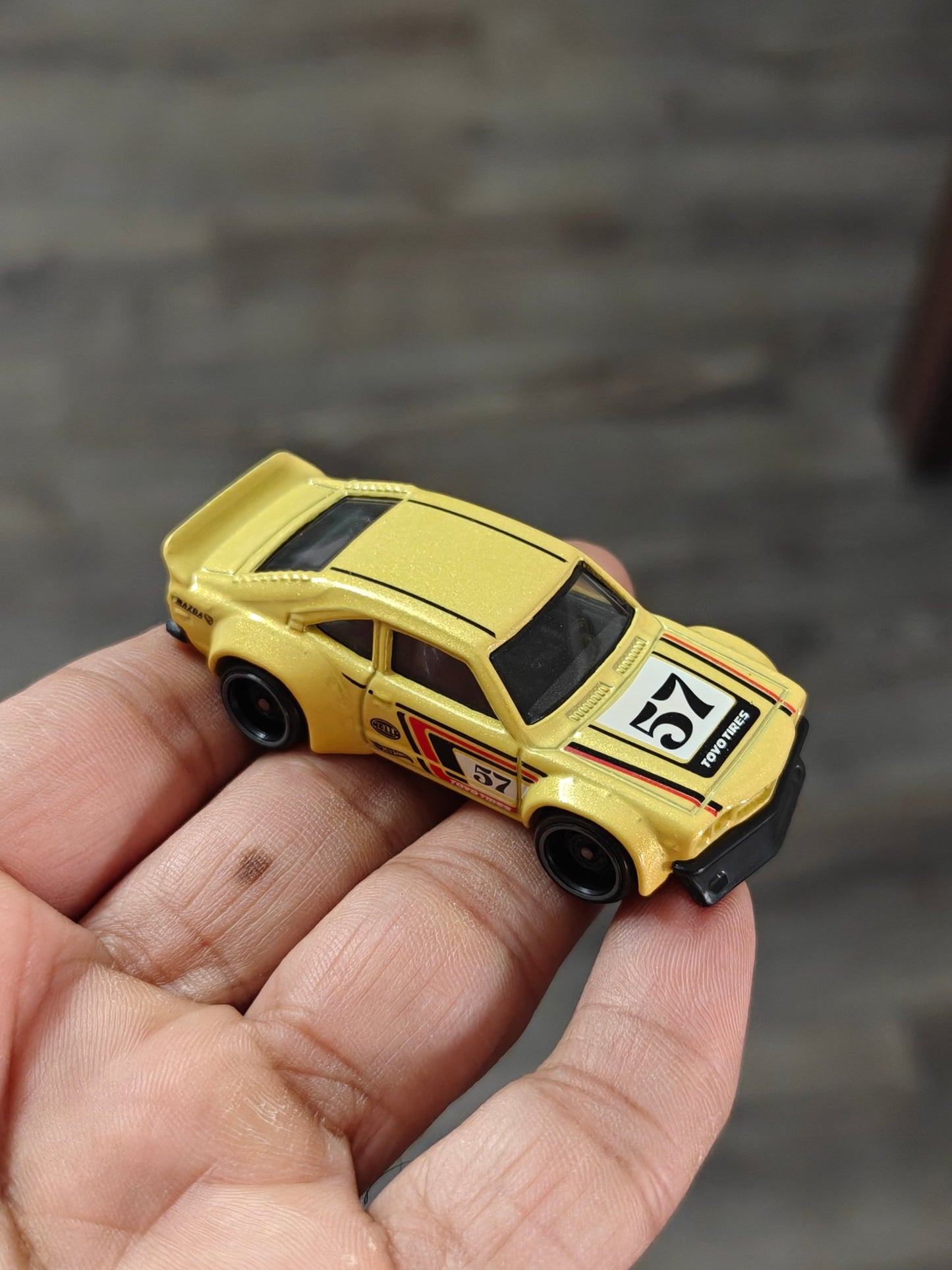 Hot Wheels Mazda RX - 3 - Yellow (Uncarded - New) - Kinder Logs