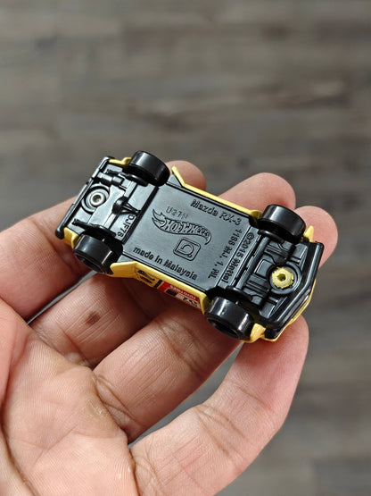 Hot Wheels Mazda RX - 3 - Yellow (Uncarded - New) - Kinder Logs