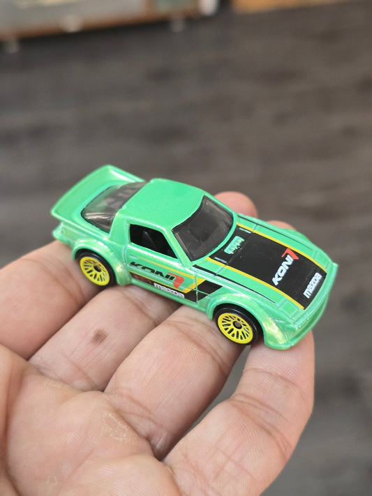 Hot Wheels Mazda RX - 7 Koni - Green (Uncarded - New) - Kinder Logs