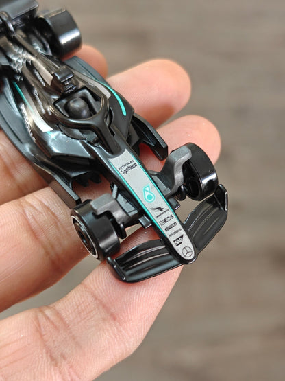 Hot Wheels Mercedes - AMG Petronas F1 Car - Black (Uncarded - New) - Kinder Logs