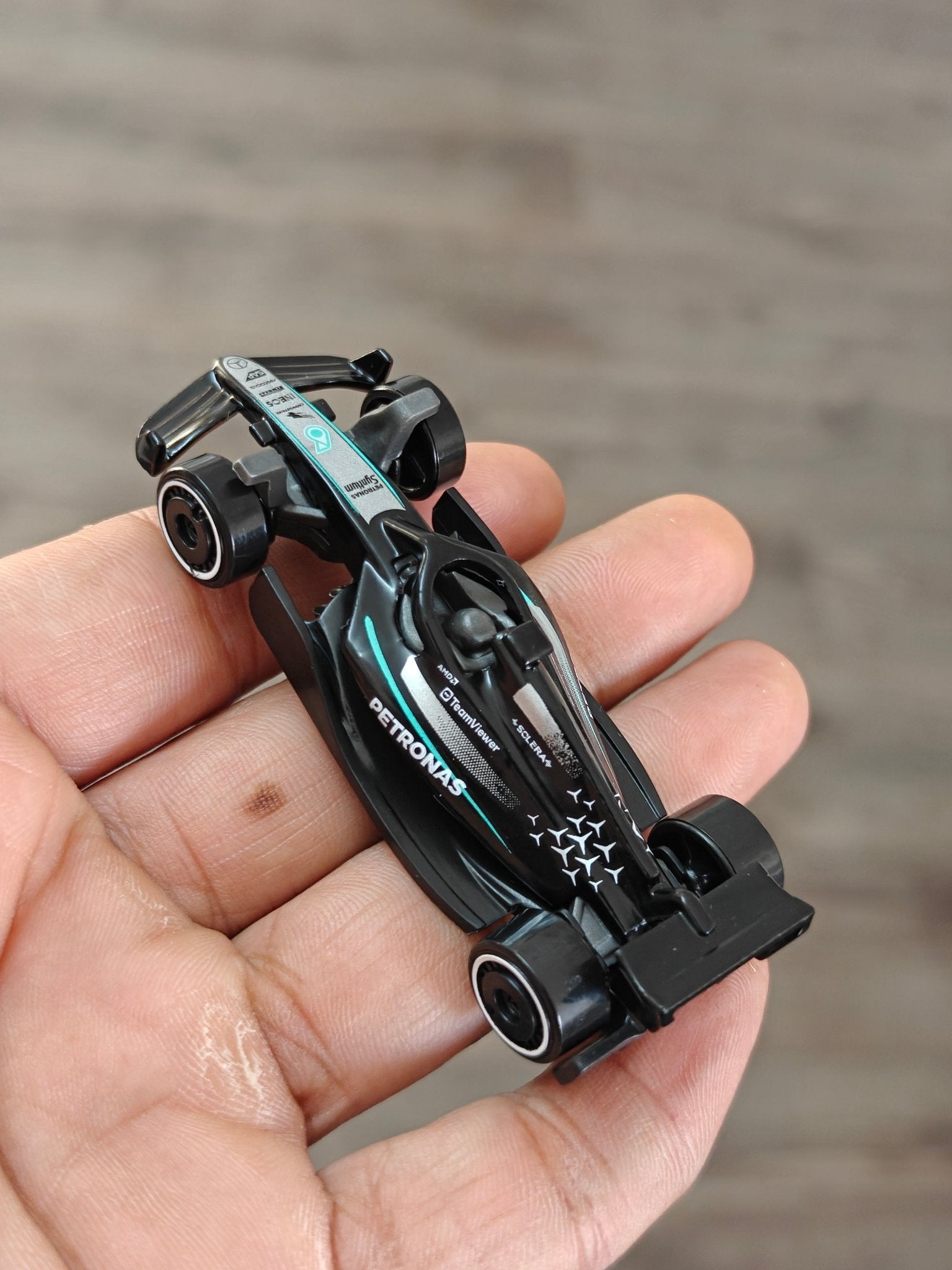 Hot Wheels Mercedes - AMG Petronas F1 Car - Black (Uncarded - New) - Kinder Logs