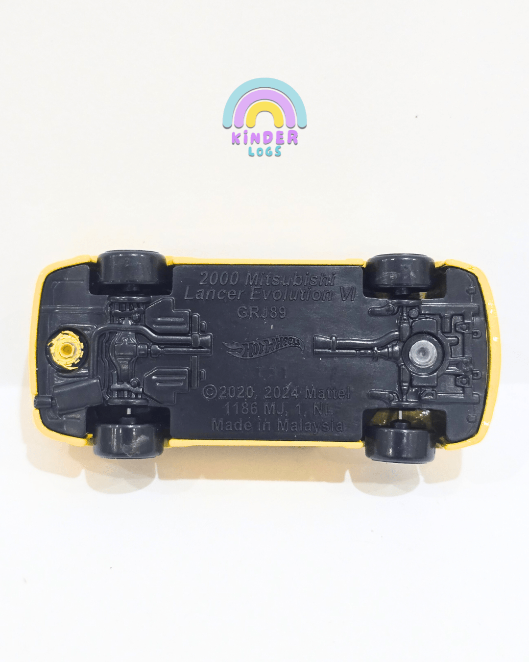 Hot Wheels Mitsubishi Lancer Evolution VI - Yellow (Uncarded) - Kinder Logs