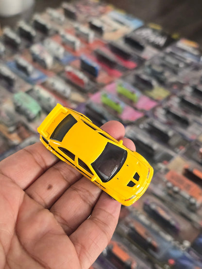 Hot Wheels Mitsubishi Lancer Evolution VI - Yellow (Uncarded) - Kinder Logs