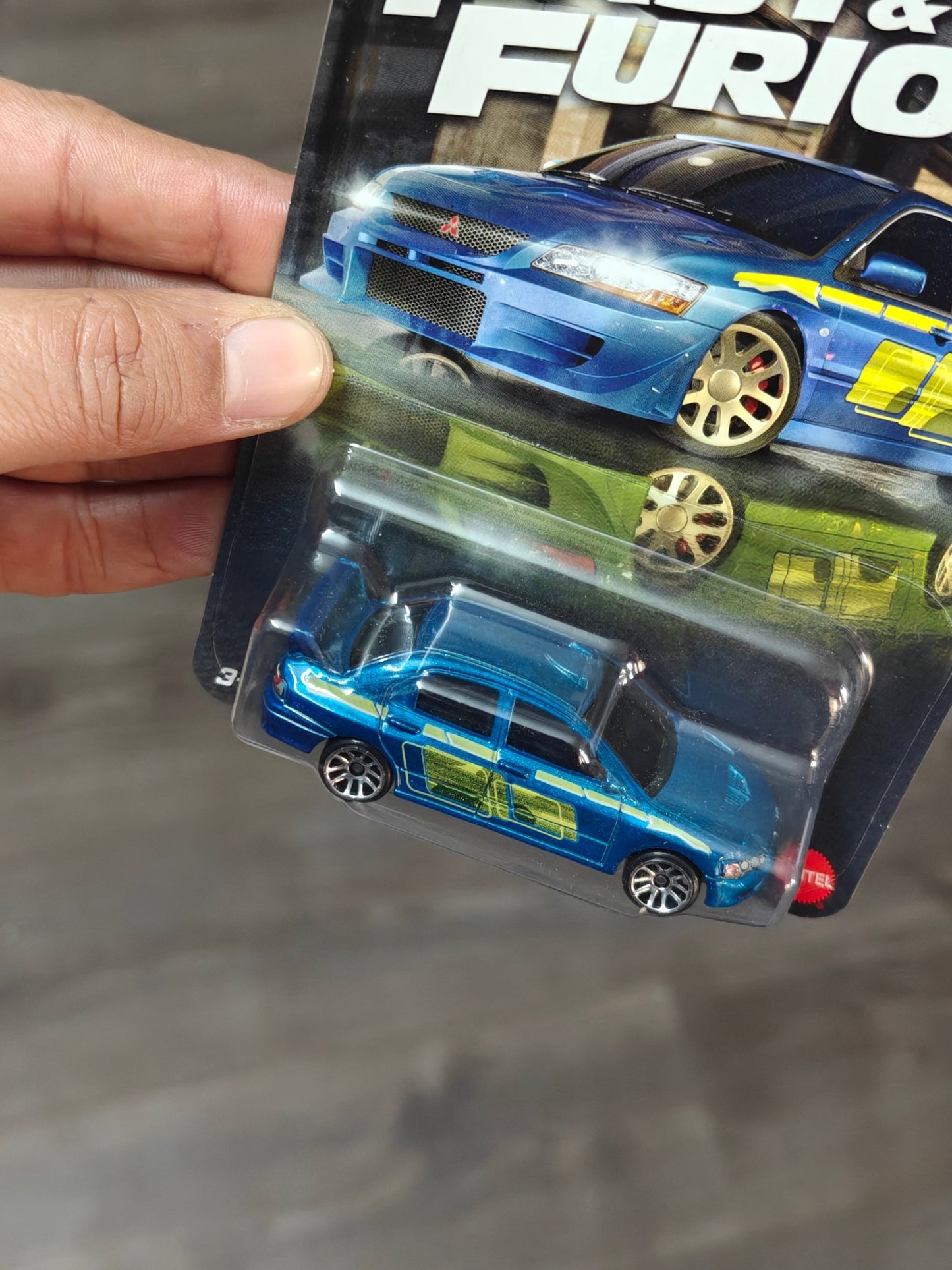Hot Wheels Mitsubishi Lancer Evolution VII - Fast and Furious Graphic Remix (Imported) - Kinder Logs
