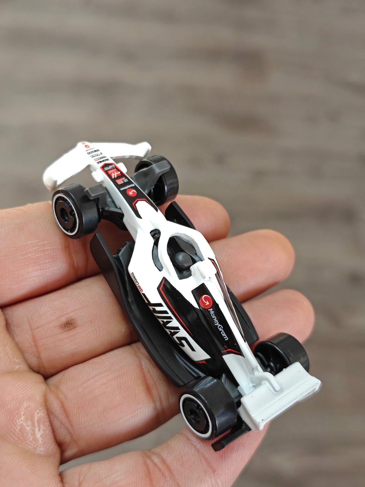 Hot Wheels MoneyGram HAAS F1 Car - White (Uncarded - New) - Kinder Logs