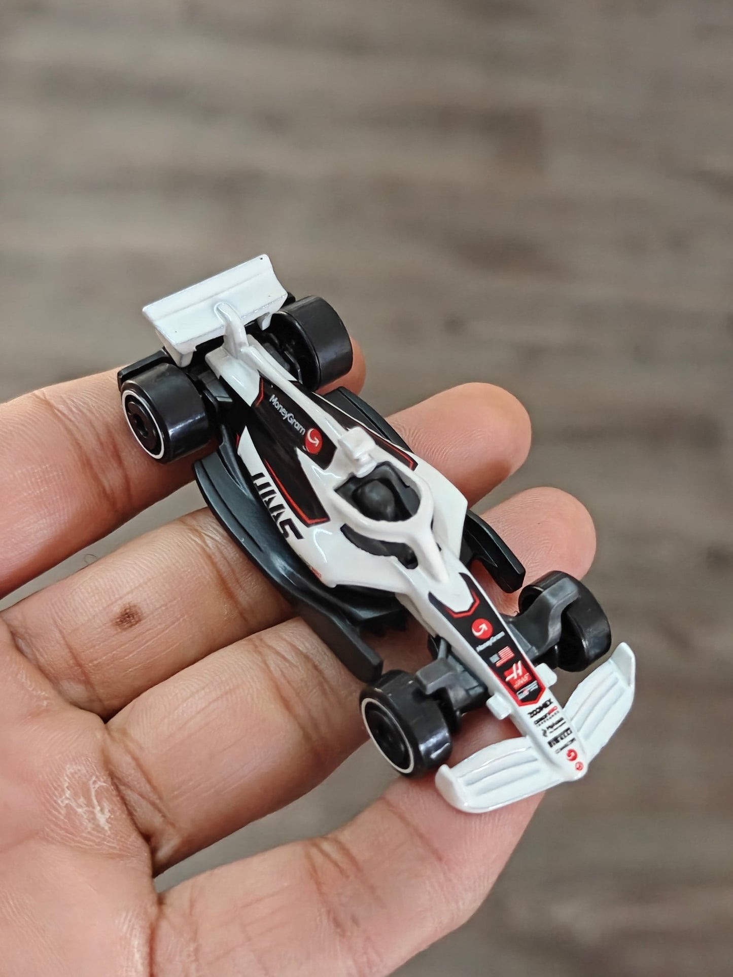 Hot Wheels MoneyGram HAAS F1 Car - White (Uncarded - New) - Kinder Logs