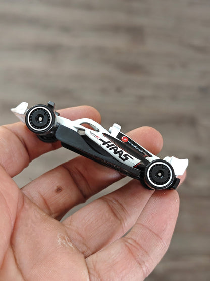 Hot Wheels MoneyGram HAAS F1 Car - White (Uncarded - New) - Kinder Logs