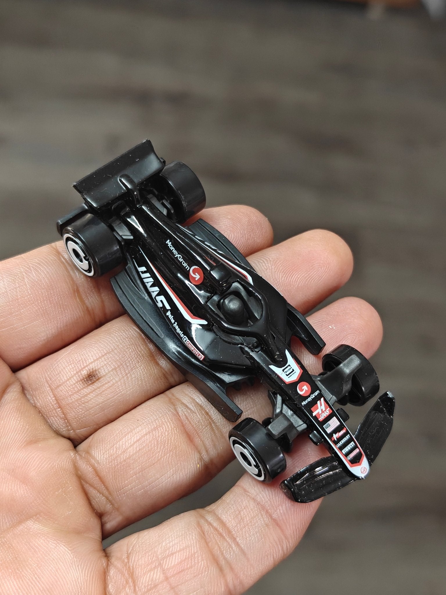 Hot Wheels MoneyGram HAAS F1 Team Car (Uncarded - New) - Kinder Logs
