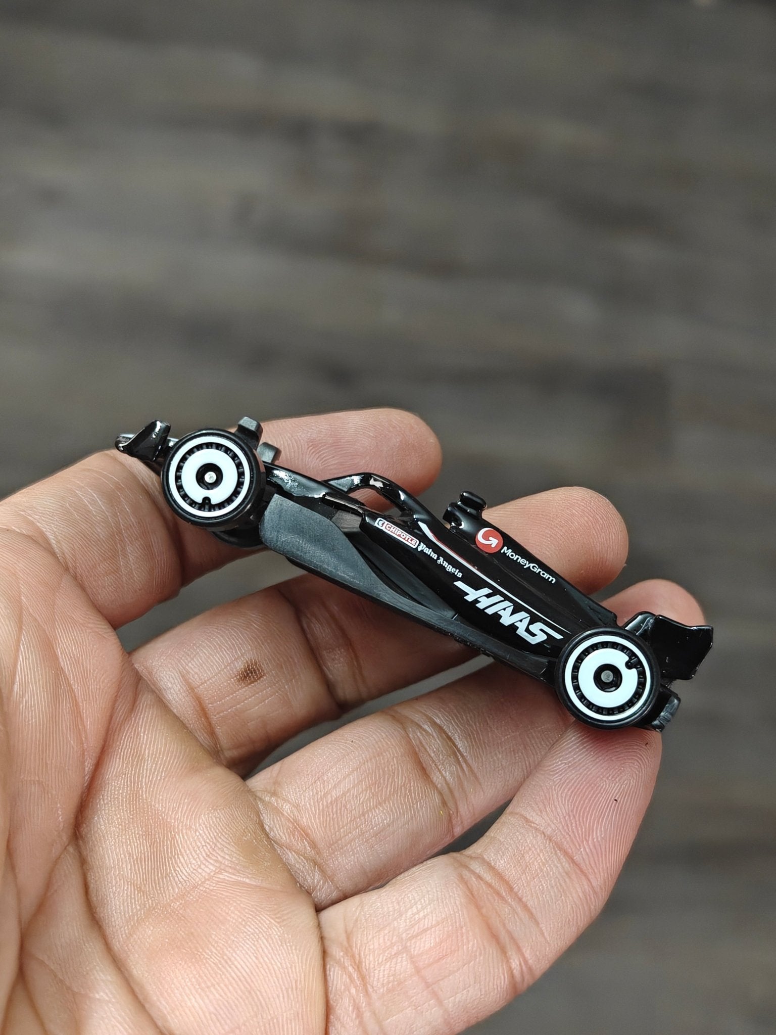 Hot Wheels MoneyGram HAAS F1 Team Car (Uncarded - New) - Kinder Logs