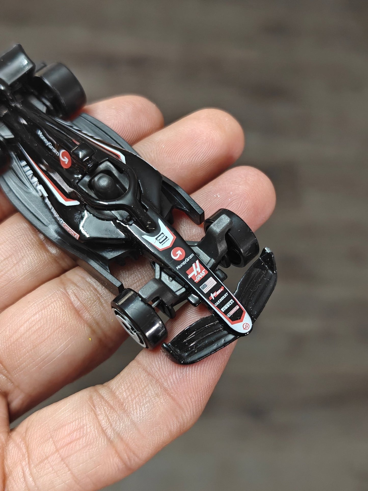 Hot Wheels MoneyGram HAAS F1 Team Car (Uncarded - New) - Kinder Logs