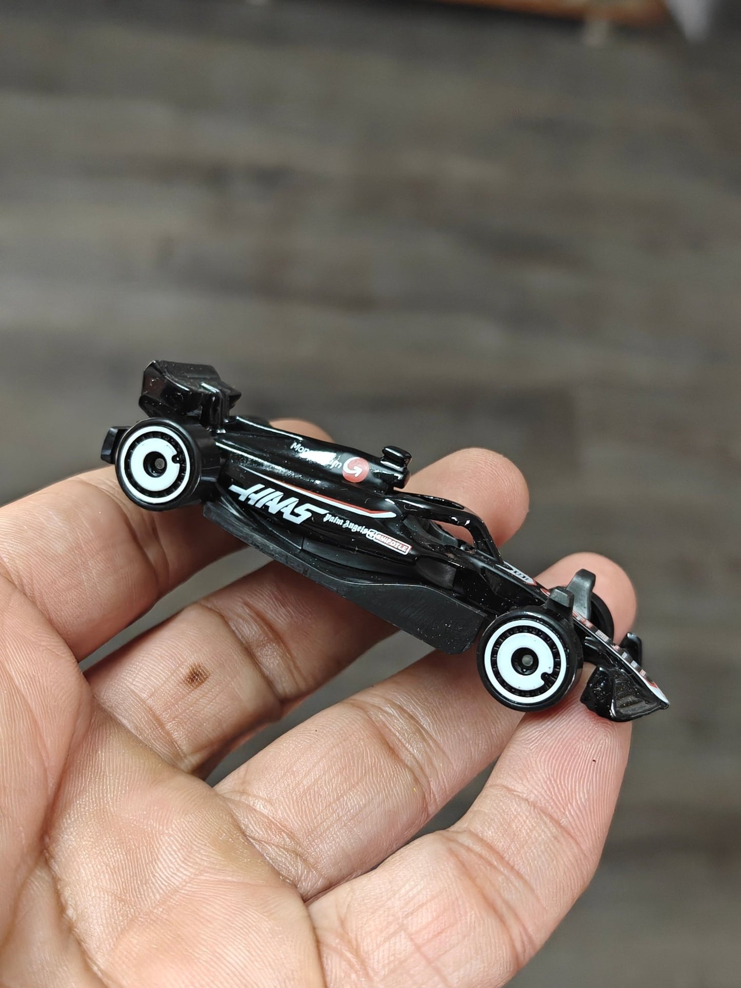 Hot Wheels MoneyGram HAAS F1 Team Car (Uncarded - New) - Kinder Logs